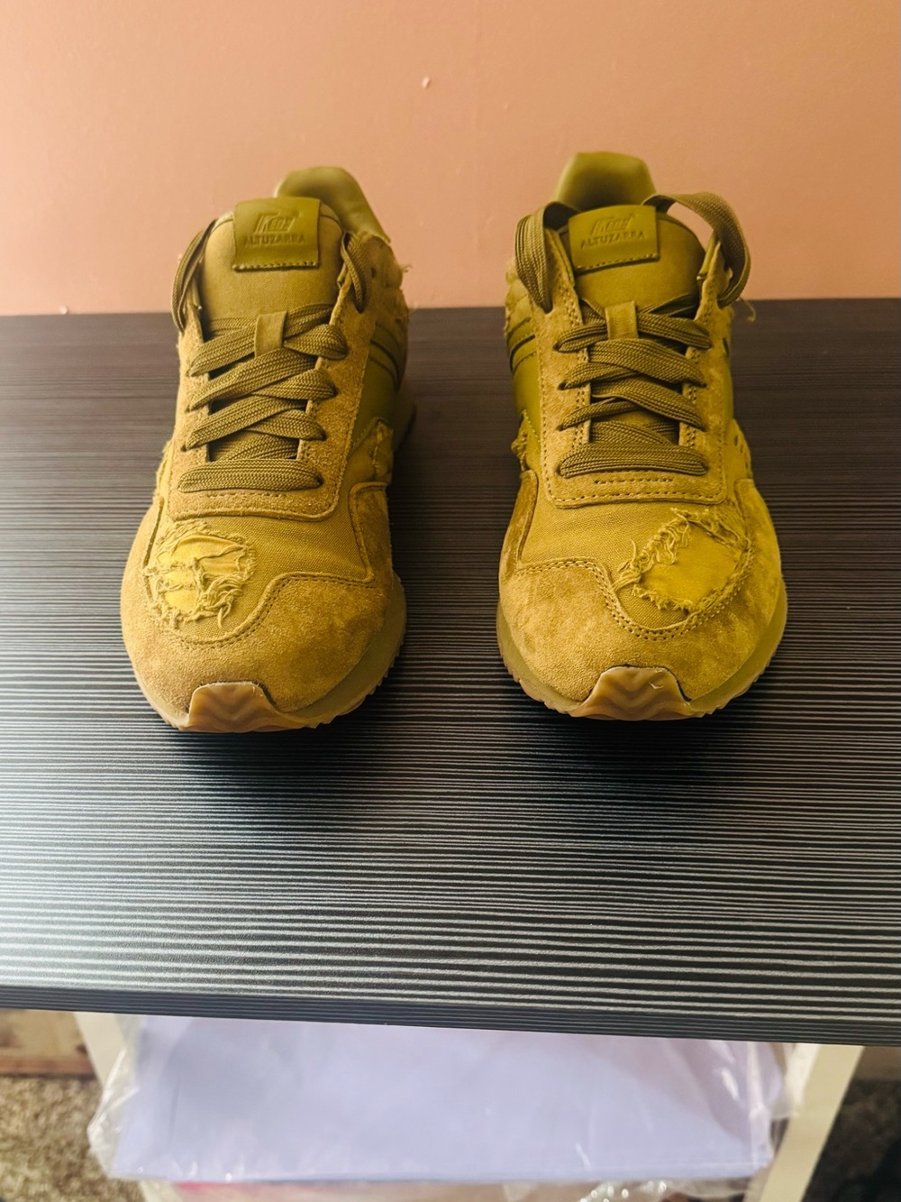 Woman’s Olive green suede Keds x Altuzarra Renaissance sneaker.